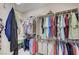 A well-organized walk-in closet provides ample storage with shelving and hanging rods at 3335 American Mustang Ct, Las Vegas, NV 89122