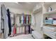 A well-organized walk-in closet provides ample storage with shelving and hanging rods at 3335 American Mustang Ct, Las Vegas, NV 89122