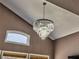 Close up of the gorgeous chandelier in the living room with view of the high ceiling at 3525 Dover Bay St, Las Vegas, NV 89129