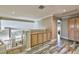 Second floor hallway featuring built in cabinets and wood-look flooring at 3525 Dover Bay St, Las Vegas, NV 89129