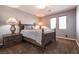 Comfortable bedroom with decorative lamps and wooden nightstands at 363 Terrill Ave, Las Vegas, NV 89183