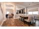 Open dining area with seating for six, seamlessly connected to the living room and entertainment space at 363 Terrill Ave, Las Vegas, NV 89183