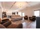 Bright, open living room with modern light fixture and elegant hardwood floors at 363 Terrill Ave, Las Vegas, NV 89183