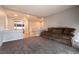Open loft area with neutral colors and comfortable brown sofa, perfect for relaxing at 363 Terrill Ave, Las Vegas, NV 89183