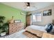 Stylized bedroom showcasing nature-themed decor, wood furniture, and a cozy window setting at 3903 Ramura Ave, North Las Vegas, NV 89084