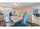 Elegant dining room features a marble top table, stylish chairs, and an open view to living spaces at 3921 White Castle St, Las Vegas, NV 89129