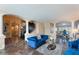 Elegant living room area featuring tile floors, stylish furniture, and an open floor plan at 3921 White Castle St, Las Vegas, NV 89129