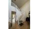 Foyer with high ceilings, staircase, tile floors, and front door at 4017 Radbourne Ave, Las Vegas, NV 89121