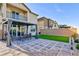 Outdoor patio with comfortable seating, pavers, turf and covered dining area at 4066 Painted Lady Ave, Las Vegas, NV 89141