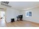 Bright bedroom with hardwood floors and a window, perfect for an office or extra room at 4066 Painted Lady Ave, Las Vegas, NV 89141