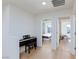 Hallway has light wood floors and flows to bedroom at 4066 Painted Lady Ave, Las Vegas, NV 89141