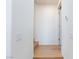 Bright hallway with wood floors leading to the stairs at 4066 Painted Lady Ave, Las Vegas, NV 89141