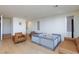 Bright living area featuring beautiful wood floors, lots of natural light, and modern furnishings at 4066 Painted Lady Ave, Las Vegas, NV 89141
