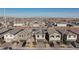 An eye-level view features various homes with attached garages, desert landscaping, and inviting exteriors at 4066 Painted Lady Ave, Las Vegas, NV 89141