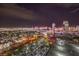 Striking aerial view of the city at night with illuminated buildings and bustling streets at 4381 W Flamingo Rd # 2308, Las Vegas, NV 89103