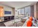 Contemporary living room boasting city views, modern furniture, and sleek entertainment center at 4381 W Flamingo Rd # 2308, Las Vegas, NV 89103