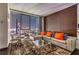 Cozy living room with modern furnishings and a view of the city skyline at 4381 W Flamingo Rd # 2308, Las Vegas, NV 89103