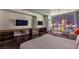 Comfortable main bedroom with large windows and city views at 4381 W Flamingo Rd # 2308, Las Vegas, NV 89103