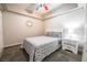 Bedroom with a ceiling fan and carpet flooring at 4535 Sparwood Dr, Las Vegas, NV 89147