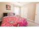 Bedroom with a twin bed, closet with sliding doors, and neutral decor at 4535 Sparwood Dr, Las Vegas, NV 89147