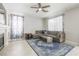 Cozy living room with a comfortable sectional sofa and stylish decor at 4535 Sparwood Dr, Las Vegas, NV 89147