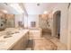 Main bathroom with a dual sink vanity, a shower, and a separate tub at 4535 Sparwood Dr, Las Vegas, NV 89147