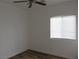 Bedroom featuring laminate floors and a window at 5240 Sweet William St, North Las Vegas, NV 89081