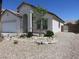 Attractive single story home in a desert landscaped front yard at 5240 Sweet William St, North Las Vegas, NV 89081