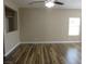 Open-concept living room featuring hardwood floors and recessed lighting at 5240 Sweet William St, North Las Vegas, NV 89081