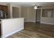 Spacious living room with hardwood floors and a ceiling fan at 5240 Sweet William St, North Las Vegas, NV 89081