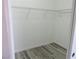 Walk-in closet features wire shelving and laminate floors at 5240 Sweet William St, North Las Vegas, NV 89081