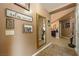 Inviting foyer with decorative mirrors and wall art leading into the home at 5481 Lincolnwood Ct, Pahrump, NV 89061