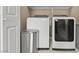 The laundry room features washer, dryer, and storage at 5667 Foxglove Field St, Las Vegas, NV 89130