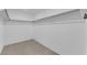 Walk-in closet with ample storage space, featuring open shelving and neutral carpeting at 5846 Bonita Rose St, Las Vegas, NV 89113