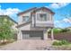 Charming two-story home features a well-manicured front yard, two-car garage, and a neutral color scheme at 5846 Bonita Rose St, Las Vegas, NV 89113