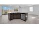Kitchen island with granite countertop, stainless steel dishwasher and natural lighting at 5846 Bonita Rose St, Las Vegas, NV 89113