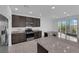 Modern kitchen with stainless steel appliances, granite countertops, and plenty of cabinet space at 5846 Bonita Rose St, Las Vegas, NV 89113