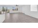 Spacious living room with abundant natural light and neutral tile flooring at 5846 Bonita Rose St, Las Vegas, NV 89113