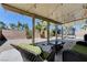 Outdoor patio area with seating and views of the backyard, great for entertaining or relaxing at 6013 Aqua Blue Ct, North Las Vegas, NV 89031