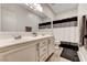Bathroom with double sinks, modern fixtures, and a shower-tub combination at 6013 Aqua Blue Ct, North Las Vegas, NV 89031