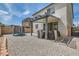 Charming backyard with a covered patio, outdoor dining set, and a trampoline at 6338 Selston Dr, North Las Vegas, NV 89081
