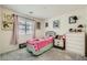 Cozy bedroom with whimsical decor, perfect for a personal space at 6338 Selston Dr, North Las Vegas, NV 89081
