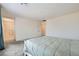 Open main bedroom with neutral carpet flooring, leading to en-suite bathroom at 6338 Selston Dr, North Las Vegas, NV 89081
