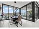 Elegant dining room with mountain views and modern lighting at 650 Scenic Cliff Dr, Henderson, NV 89012