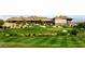 Expansive golf course view from afar, with sand traps and neatly manicured landscaping at 650 Scenic Cliff Dr, Henderson, NV 89012