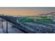 Expansive view of the golf course and mountain range from the property's outdoor space at 650 Scenic Cliff Dr, Henderson, NV 89012