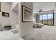 View from the main bedroom shows an ensuite bathroom, as well as beautiful views of the landscape at 650 Scenic Cliff Dr, Henderson, NV 89012