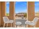 Balcony with two chairs overlooking the neighborhood at 7354 Strutting Silver Ct, Las Vegas, NV 89131