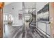Grand foyer showcasing a beautiful staircase, high ceilings, and wood-look flooring at 7354 Strutting Silver Ct, Las Vegas, NV 89131