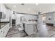 Spacious kitchen with quartz island and modern appliances at 7354 Strutting Silver Ct, Las Vegas, NV 89131